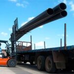 full-hombre-carga-tubos